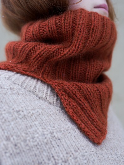 Ruke Knit neck warmer knitting pattern close-up showing rib stitch texture and hand knit details