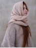 Side view of Ruke Shoulder Shawl knitting pattern worn as hooded shoulder shawl, timeless hand knit design