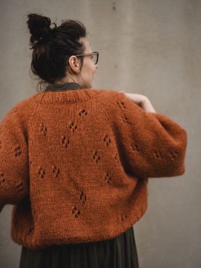 Cherry Blossom cardigan knitting pattern back view on model by Ruke Knit