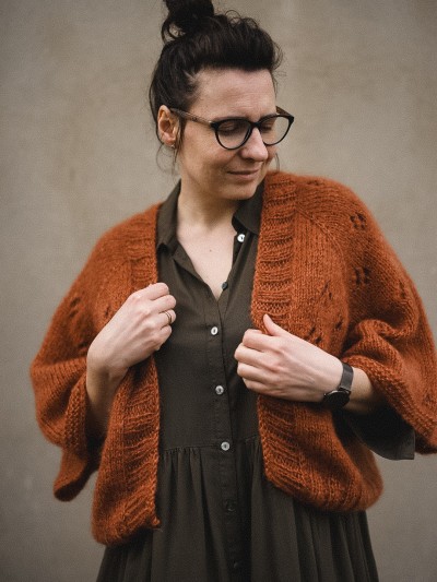 Cherry Blossom cardigan knitting pattern front view on model by Ruke Knit