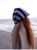 Ruke Headscarf knitting pattern striped hood back view by the sea