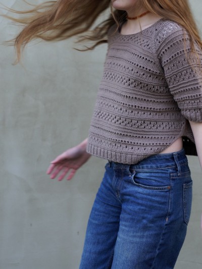 Yoga Summer sweater knitting pattern side view on model in motion