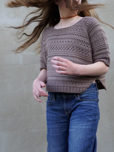 Yoga Summer sweater knitting pattern front view on model in motion