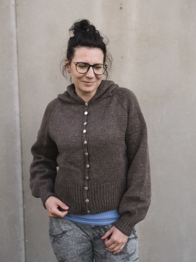 Autumn Hooded cardigan knitting pattern front view on model by Ruke Knit