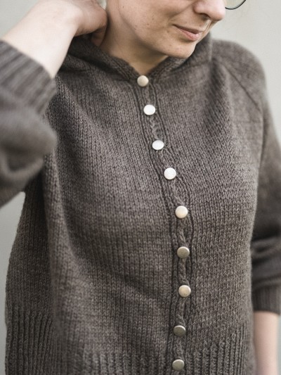 Autumn Hooded cardigan knitting pattern front detail close-up with buttons and hood