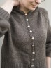 Autumn Hooded cardigan knitting pattern front detail close-up with buttons and hood