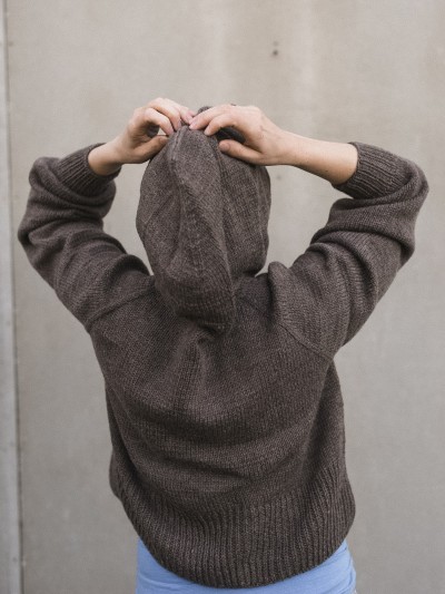 Autumn Hooded cardigan knitting pattern hood worn back view on model