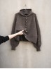 Autumn Hooded cardigan knitting pattern flat lay with hood and balloon sleeves