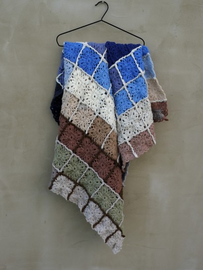 Grandma’s Crocheted Blanket crochet pattern front view hanging on a wall by Ruke Knit