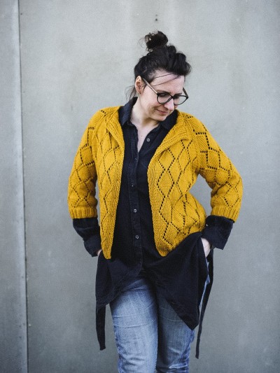 Front view of the yellow Diamond Cardigan knitting pattern by Ruke Knit