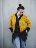 Front view of the yellow Diamond Cardigan knitting pattern by Ruke Knit