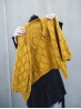 Inside view of the Diamond Cardigan knitting pattern showing its lace construction