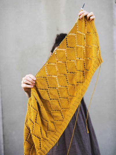 Diamond Cardigan knitting pattern by Ruke Knit with diamond lace fabric in progress